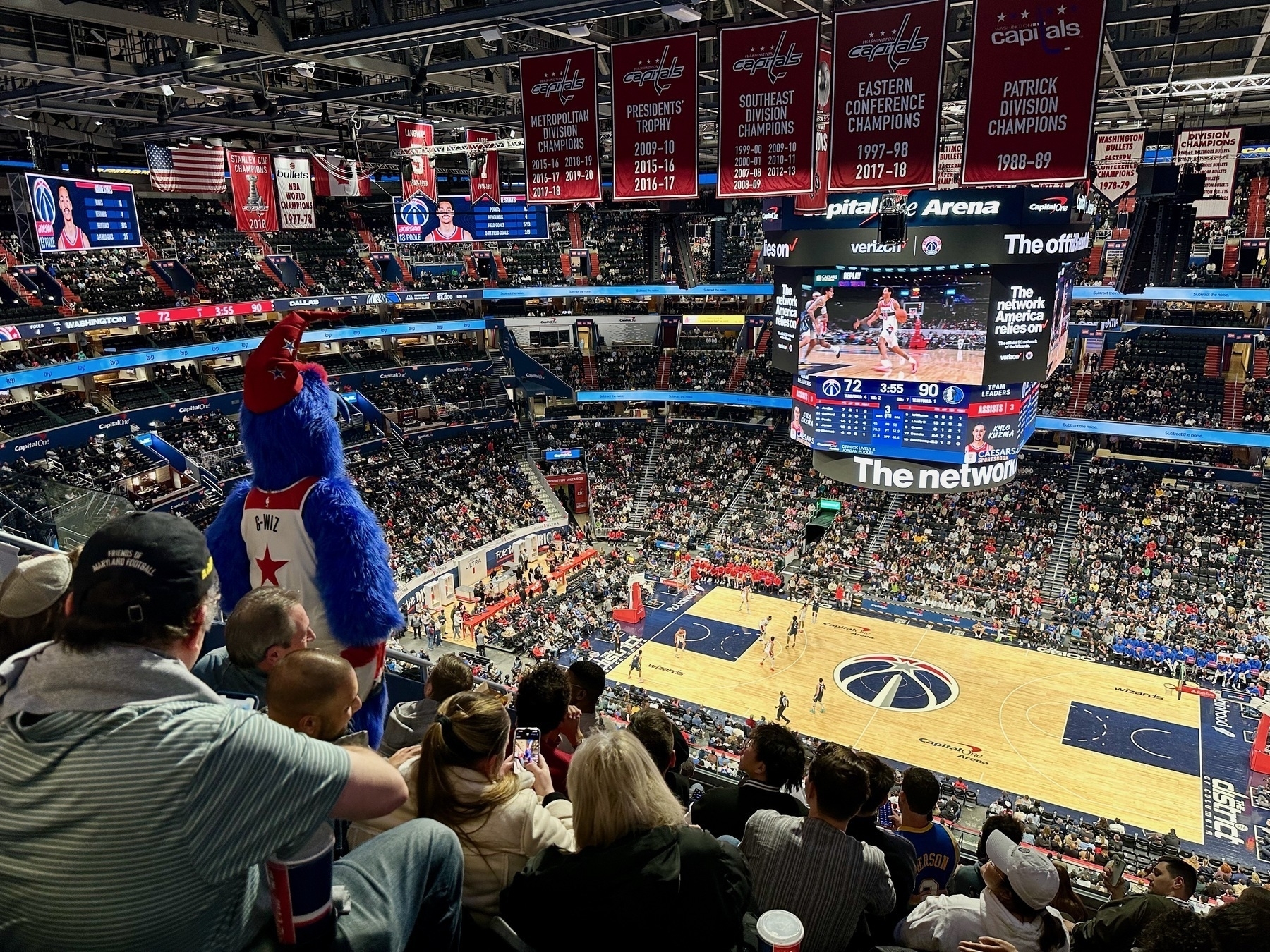 Photo of the Washington Wizards&#39; mascot looking at the court from up high.