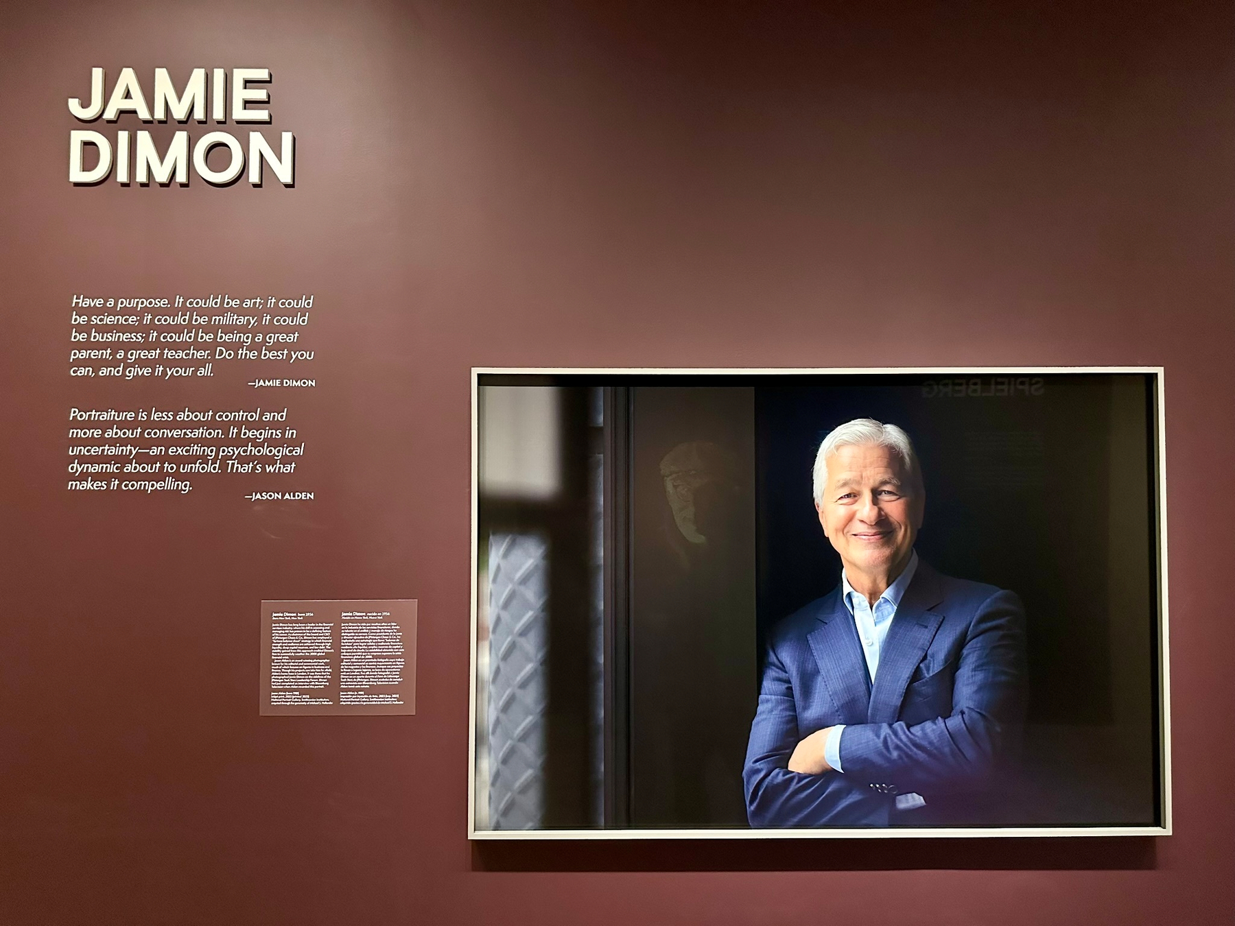 Portrait of Jamie Dimon at the National Portrait Gallery, next to a quote from him and the portrait artist.